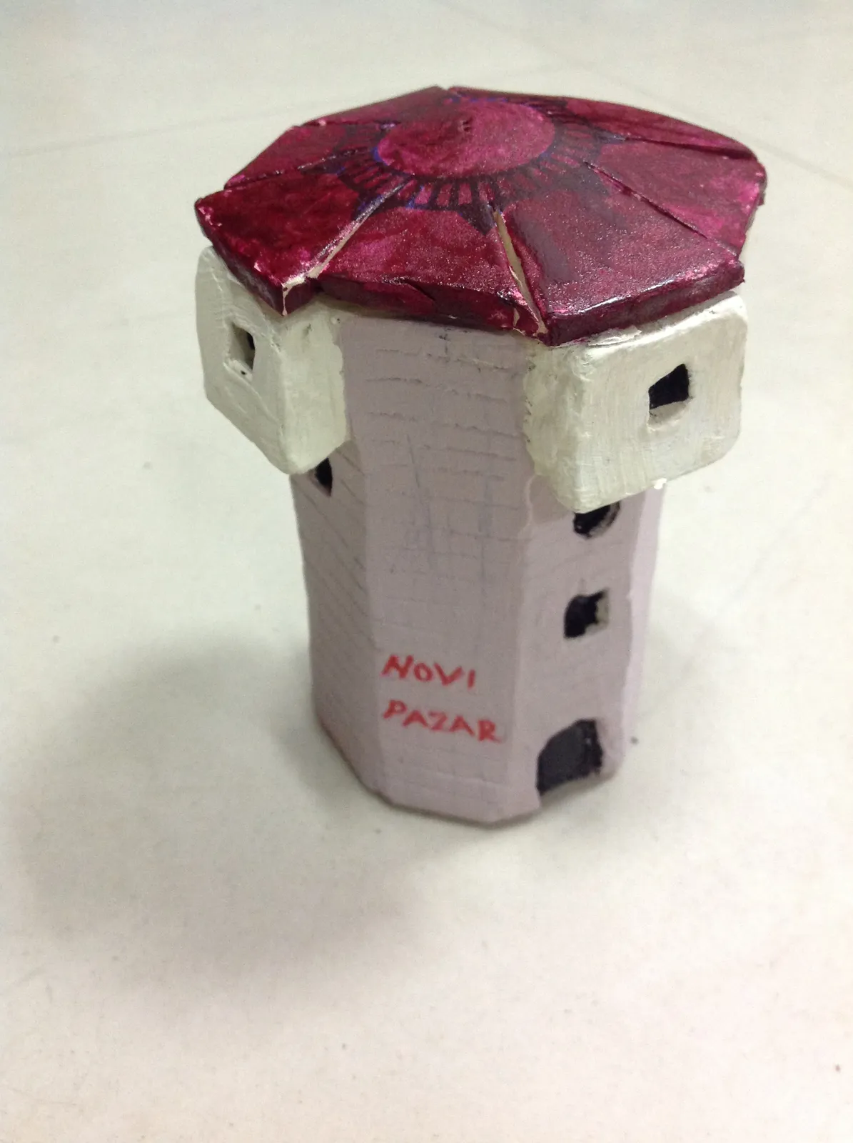 A hand-made ceramic model of the fortress tower