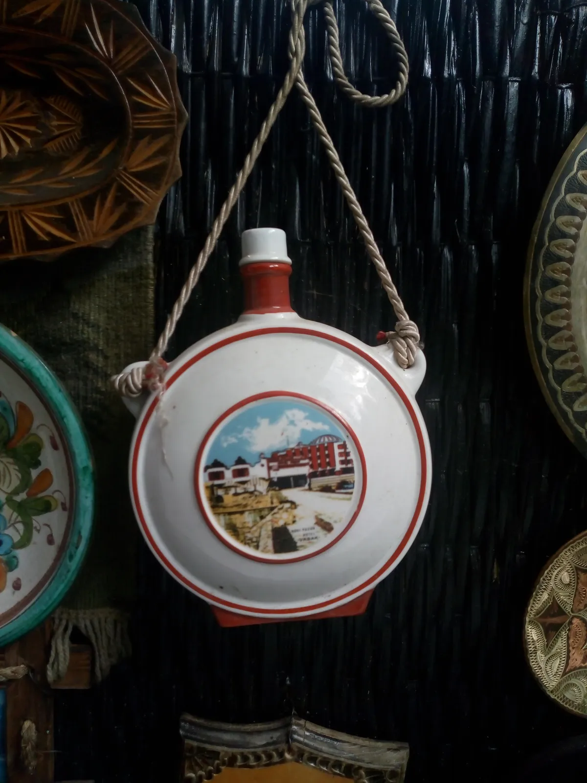 A painted ceramic flask
